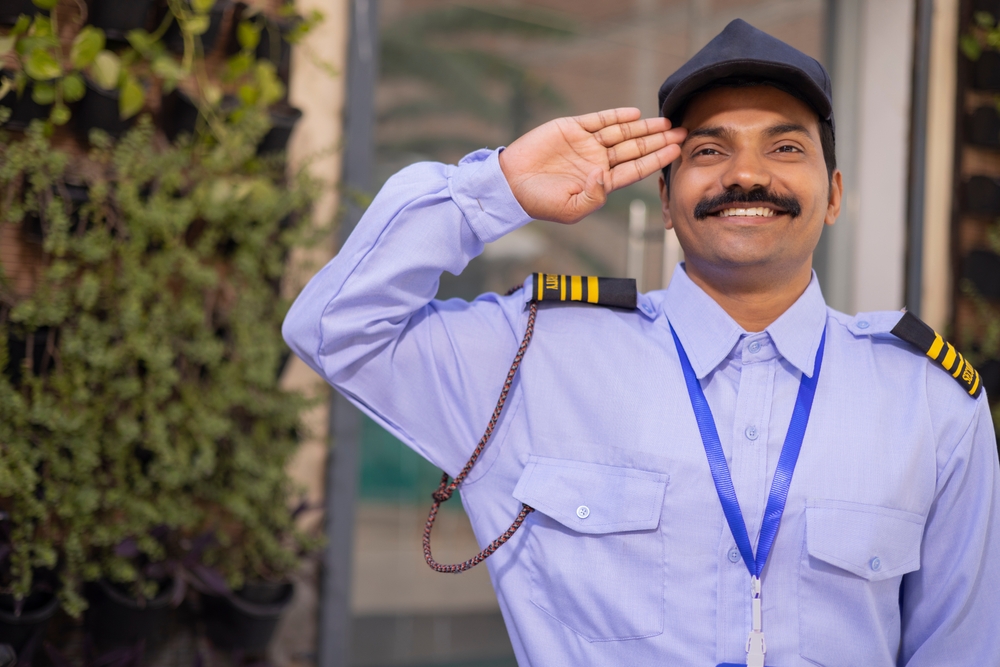 Portrait,Of,A,Male,Security,Guard,Saluting