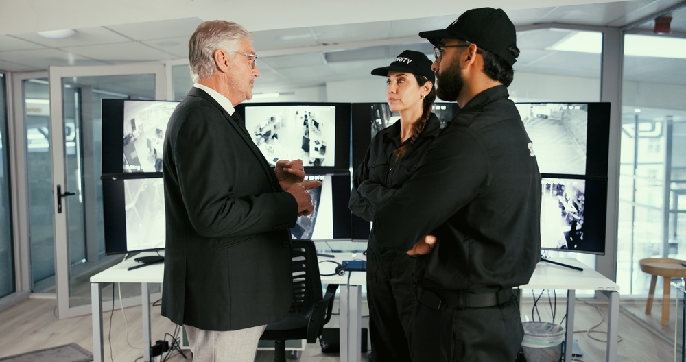 People,,Security,Guard,And,Meeting,With,Team,In,Control,Room