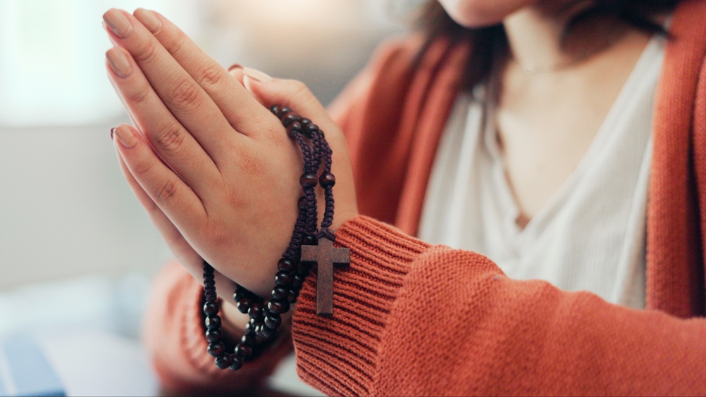 Praying,,Rosary,And,Hands,Of,Woman,In,Home,For,Religion,